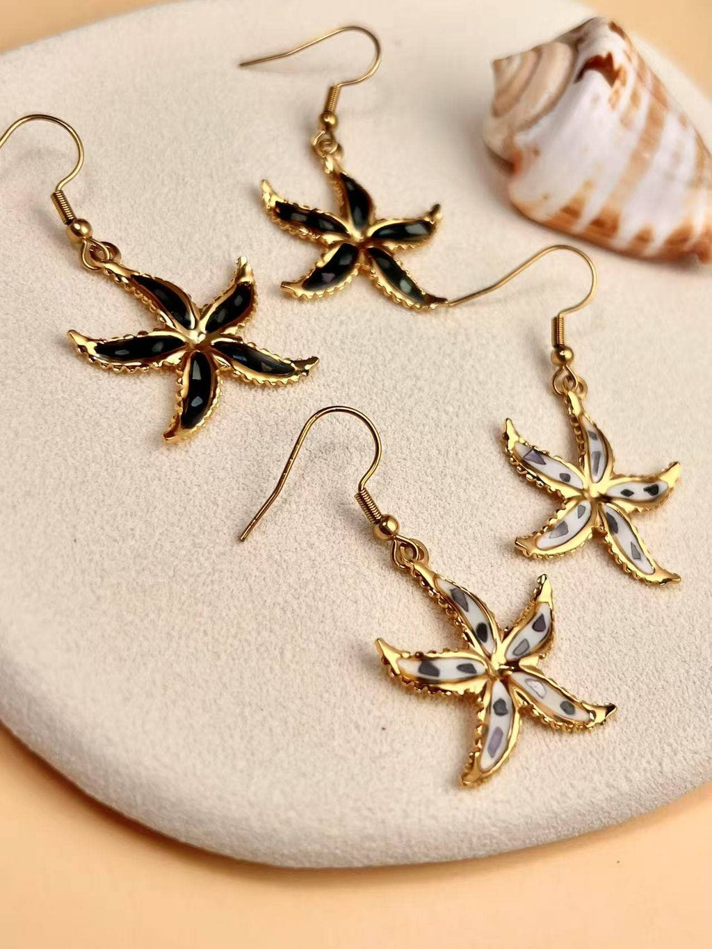 Mother-of-pearl starfish earrings in gold stainless steel
